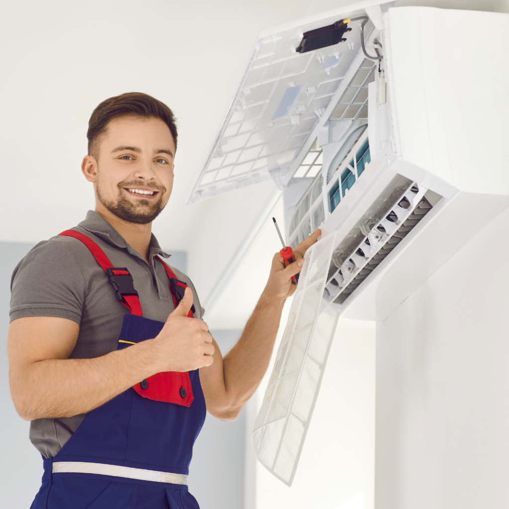 Air conditioning technician giving a thumbs up